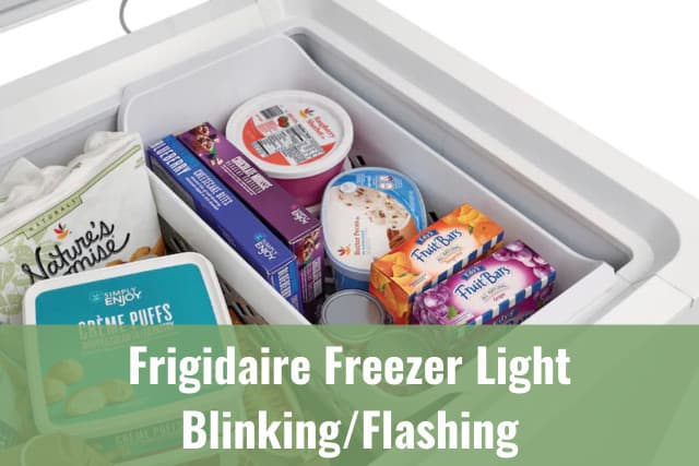 White Frigidaire with frozen food inside