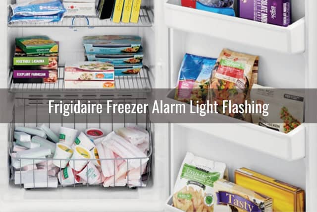 White Frigidaire with frozen food inside