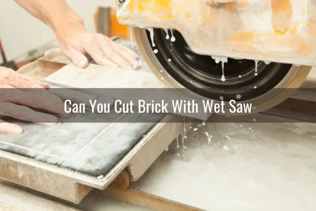 Cutting a brick using a machine