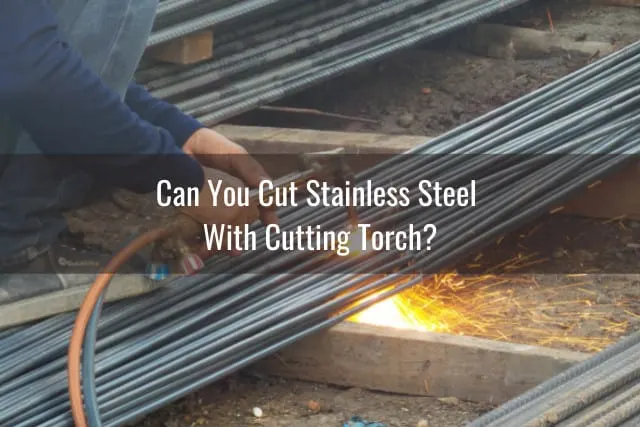 Man cutting stainless steel