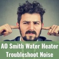 Man plugging both ears because of loud noise