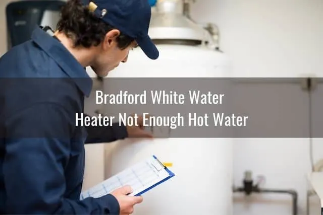 Home inspector checking white residential water heater