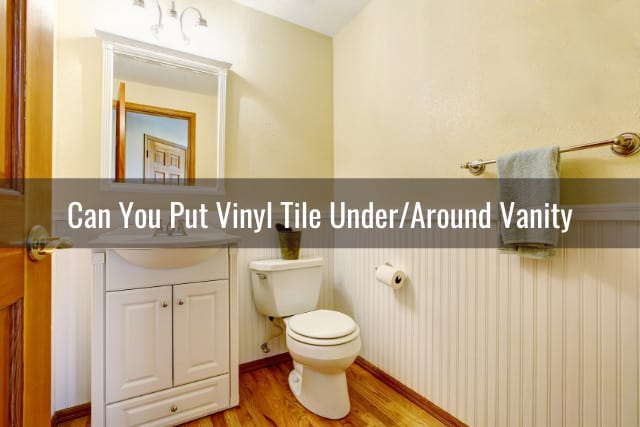 White vanity with vinyl tile