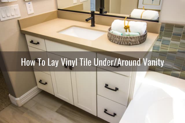 White vanity with vinyl tile