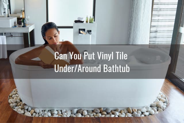 White bathtub with vinyl tile