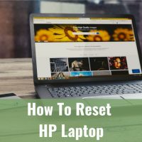 Using black laptop while on the desk