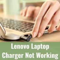 Woman charging the laptop