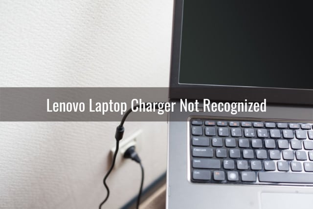 Woman charging the laptop