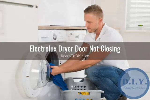 modern white dryer and frustrated man