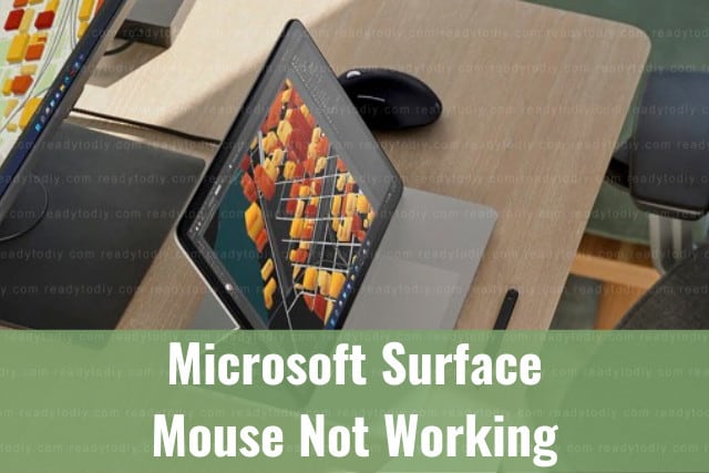Black microsoft surface on the table