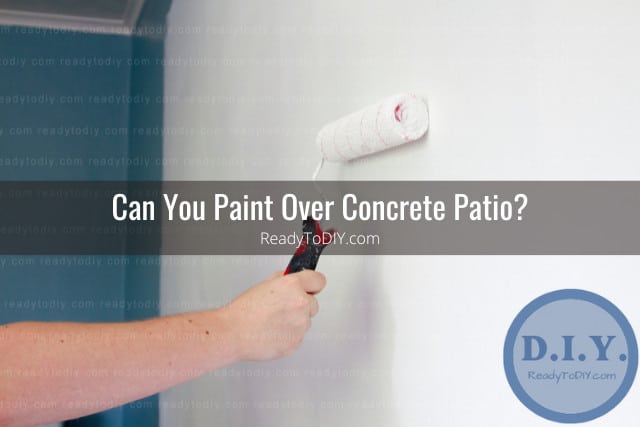 Painting the concrete using roll brush