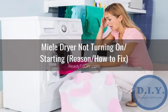 Woman putting clothes inside the dryer