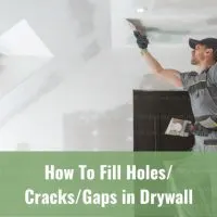 Man fixing the drywall