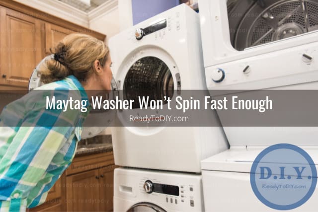 Woman looking at the inside of the washer