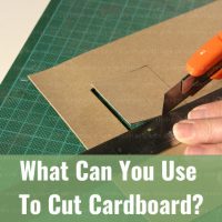 Cutting the cardboard using cutter
