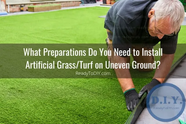 Man putting artificial grass on the ground