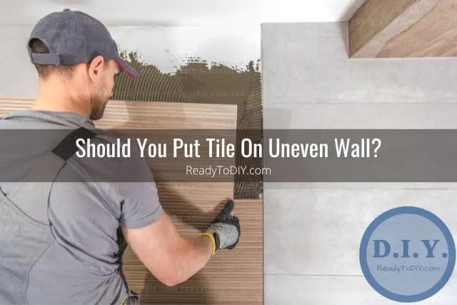 putting tile on the wall