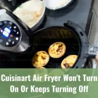 Black Air fryer with food inside