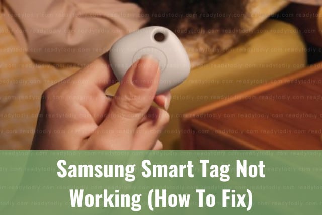 Holding white latest smart tag