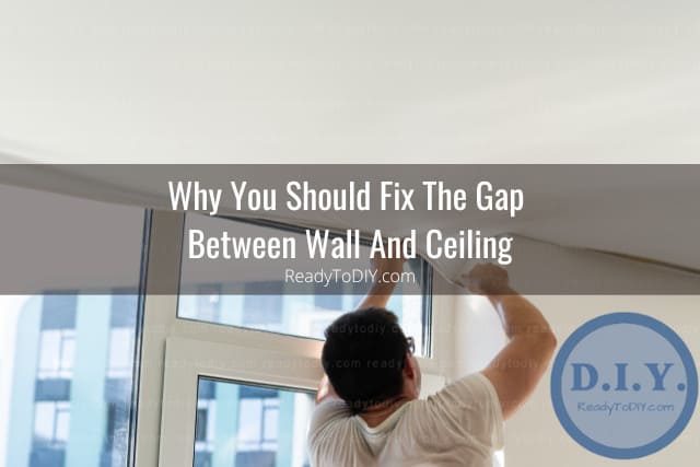 Man fixing the wall and ceiling using cement
