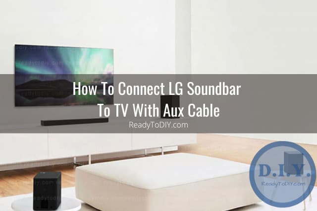 Flat screen tv in the living room with Soundbar Below