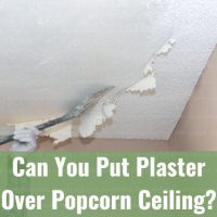 Man removing popcorn ceiling