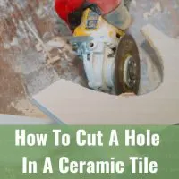 Man cutting ceramic tile in hole