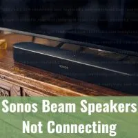 Black latest speaker below flatscreen tv