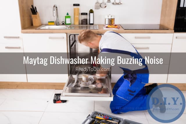 Man fixing dishwasher