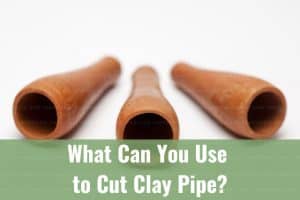 Three brown clay pipe