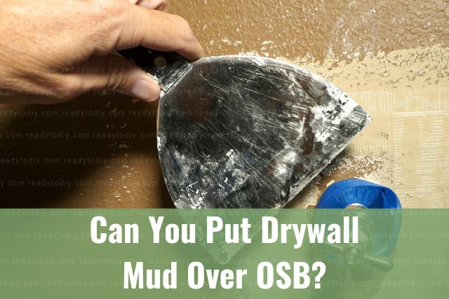 putting mud on the drywall