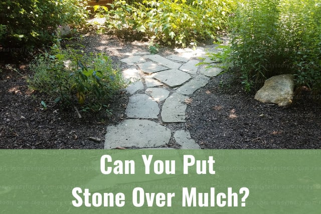 Stone on mulch with plans