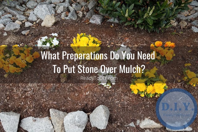 Stone on mulch with plans