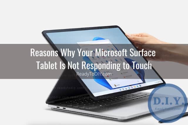 Black microsoft surface tablet on the table