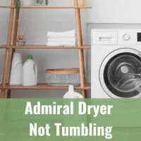 White dryer machine with clothes