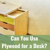 Man working on the plywood desk
