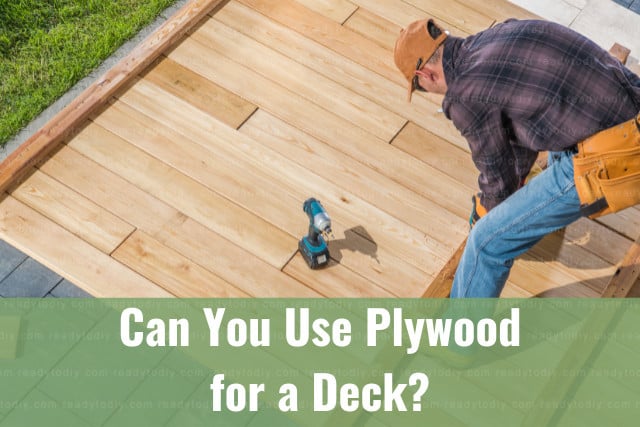 Man fixing plywood in the deck